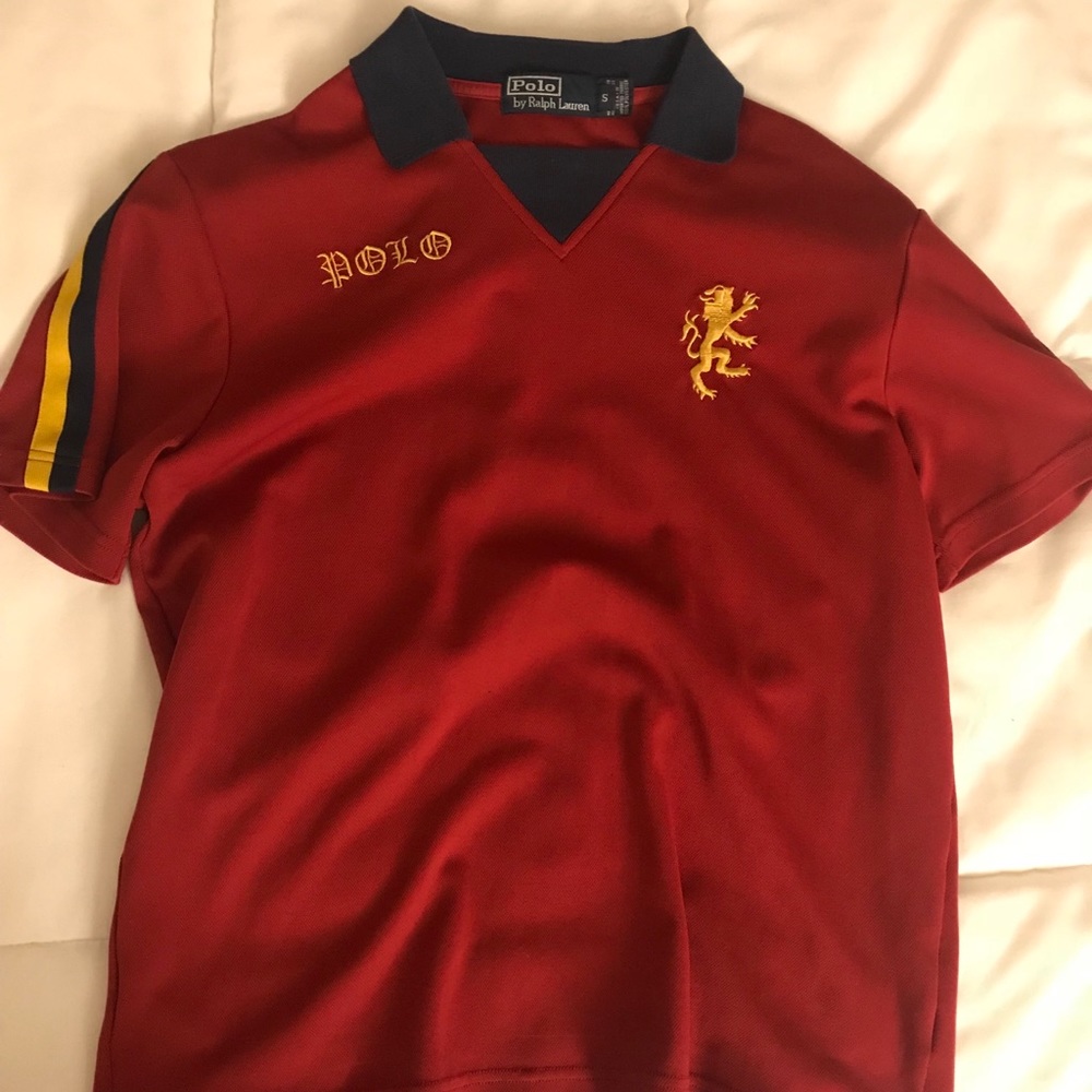 Belgian flag themed athletic shirt.